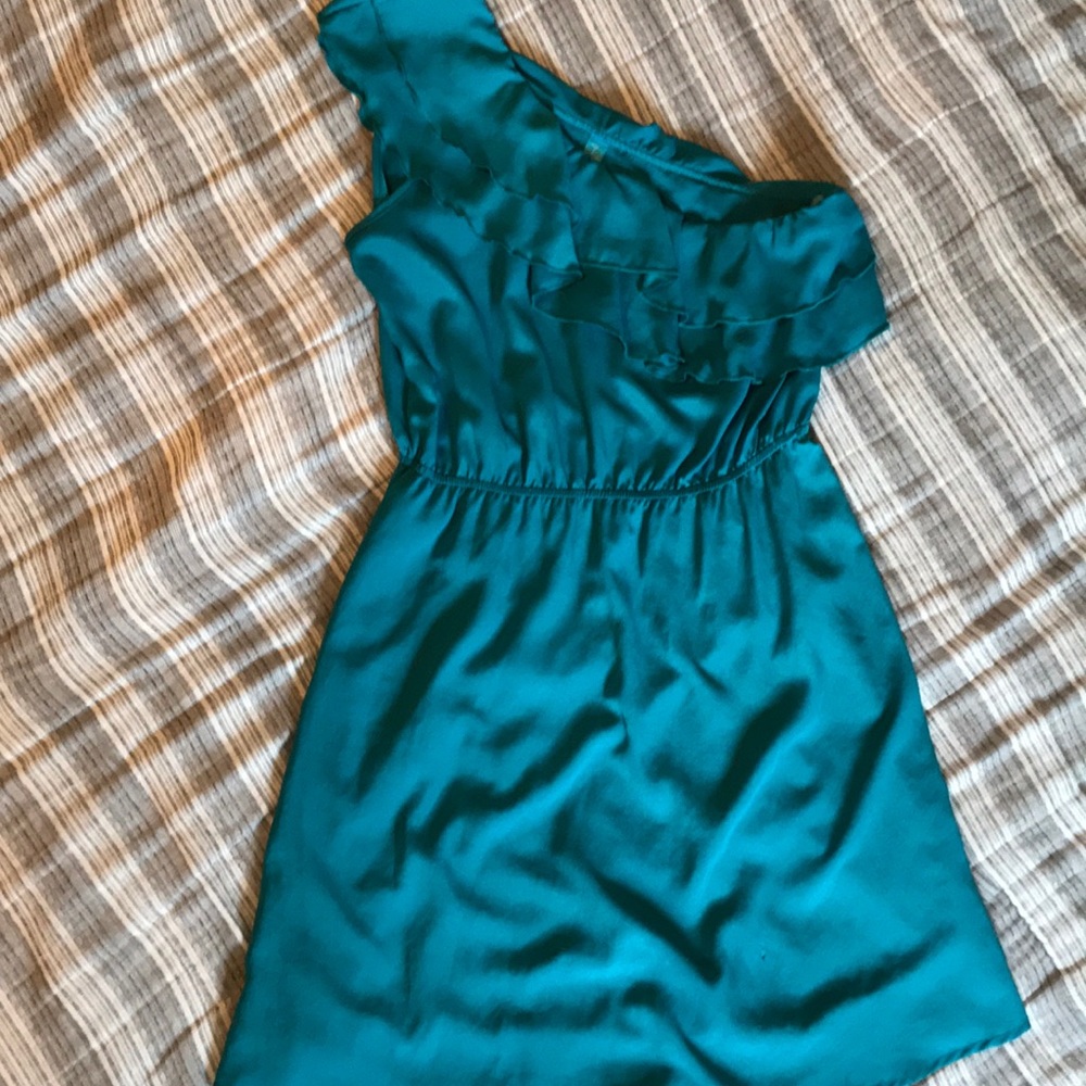 Turquoise asymmetrical cocktail dress.